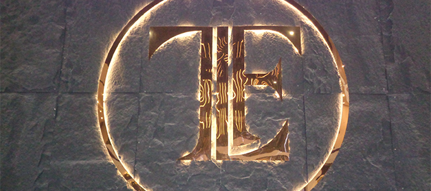 Liquor bottle display rack in a modern Indian wine shop for better product visibility, New Delhi