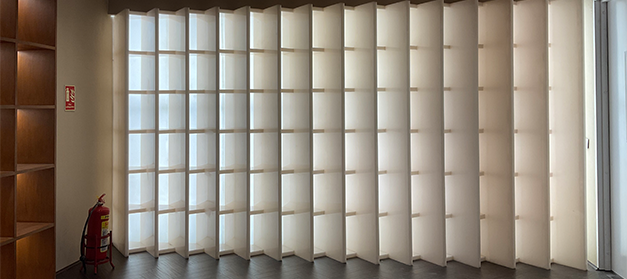 Liquor bottle display rack in a modern Indian wine shop for better product visibility, New Delhi