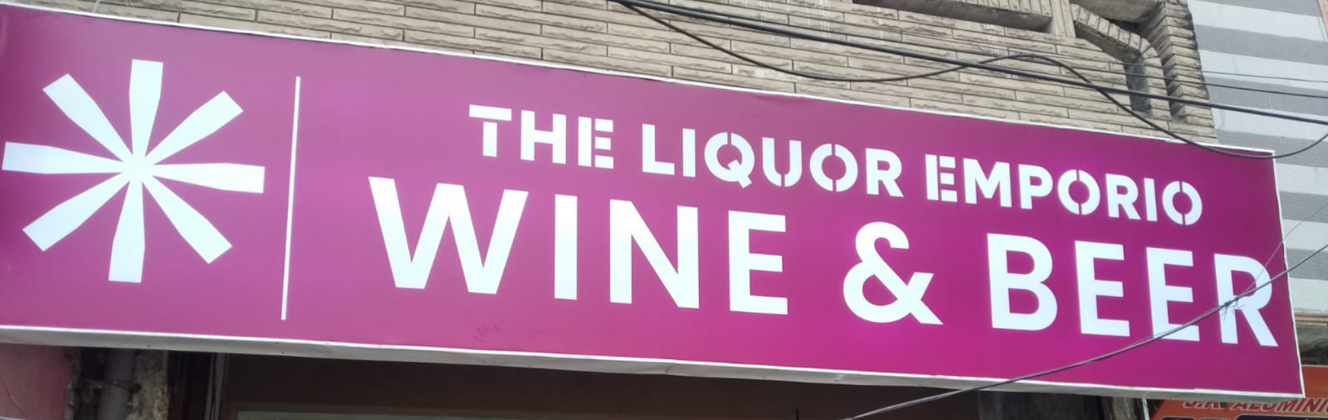 The Liquor Emporio 586 Govindpuri glow sign board in New Delhi