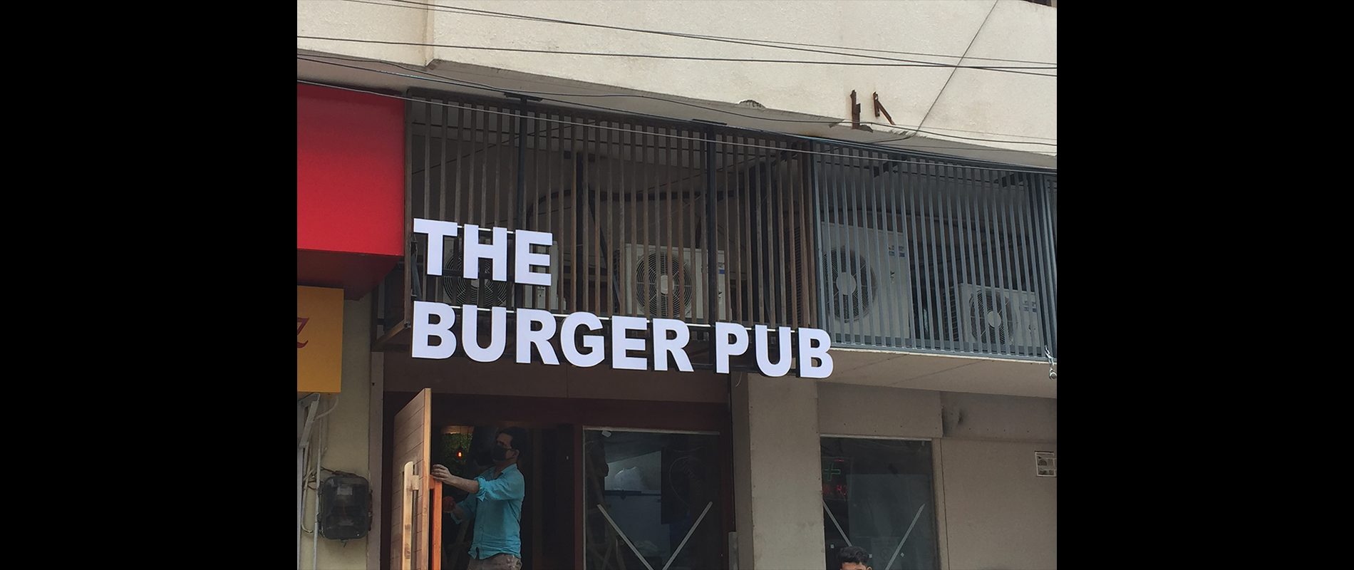 The Burger Pub restaurant branding and interior decor in Civil Lines New Delhi