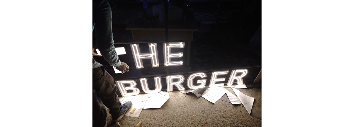 Front-lit channel letters on a retail facade